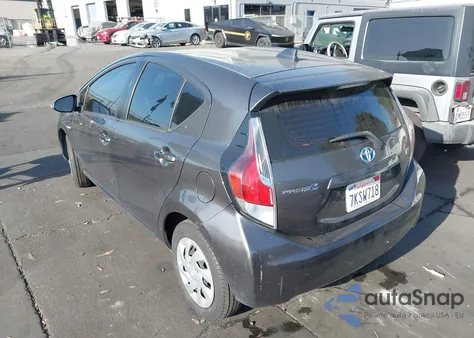 2015 Toyota Prius C from USA, damaged, VIN JTDKDTB33F1583432